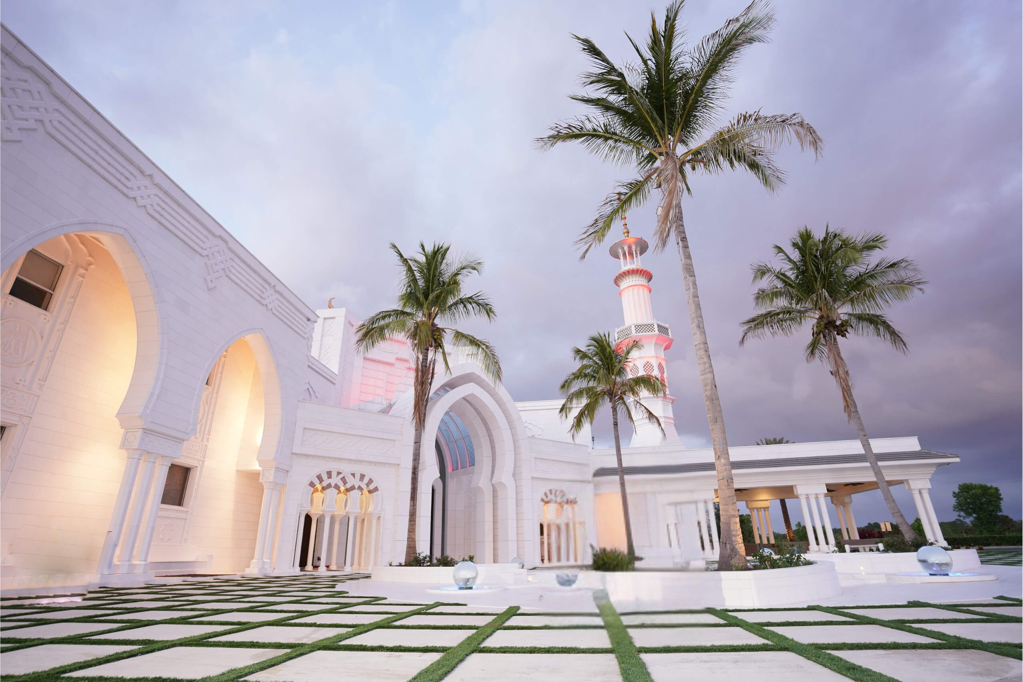 Masjid Al Hayy - Beautiful mosque exterior with palm trees
